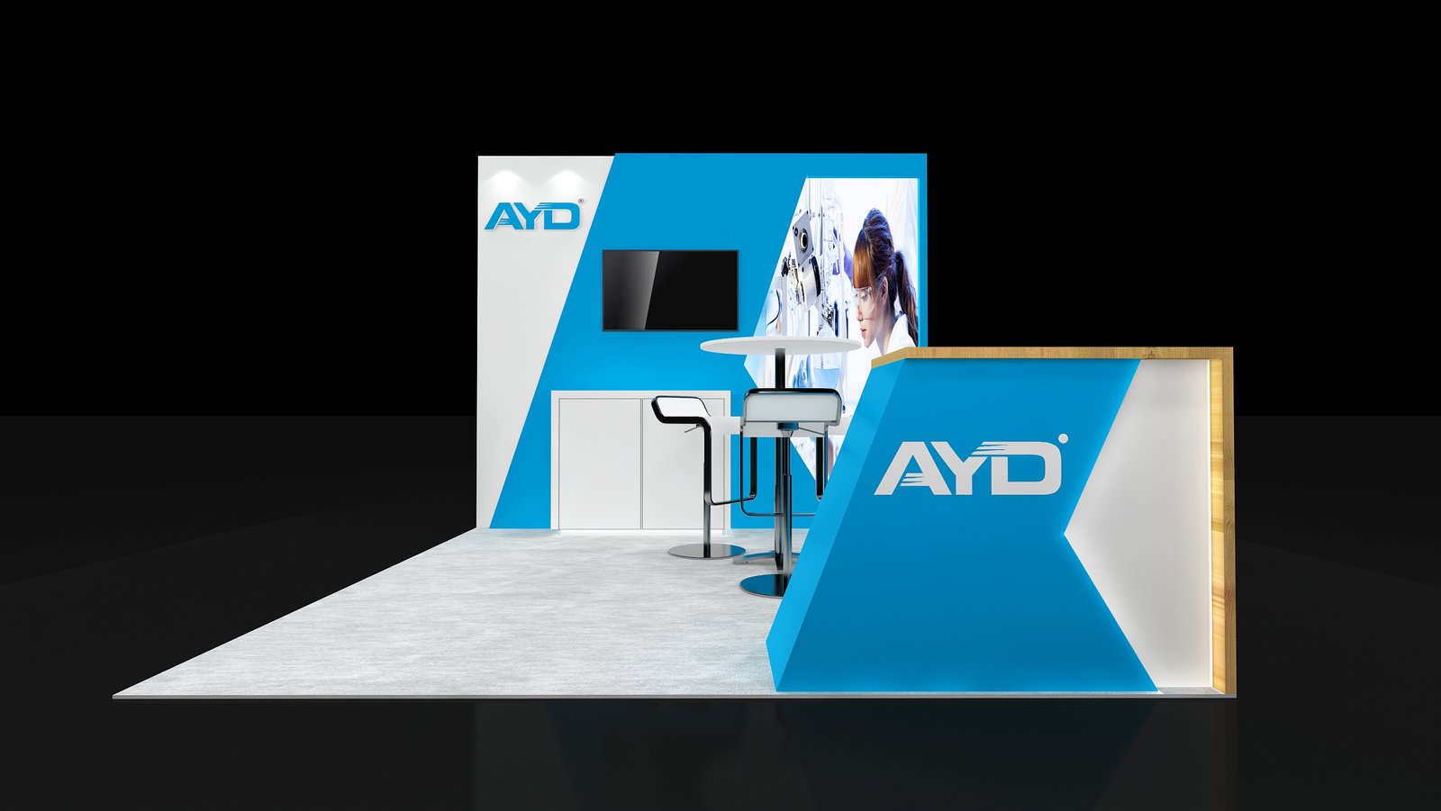 Front view of the blue reception counter and monitor backwall in EXM-1010-002