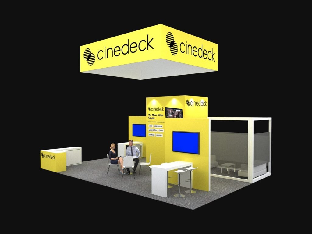 20x30 demo suite booth EXM-2030-001 with yellow brand tower, two screen stations and meeting room