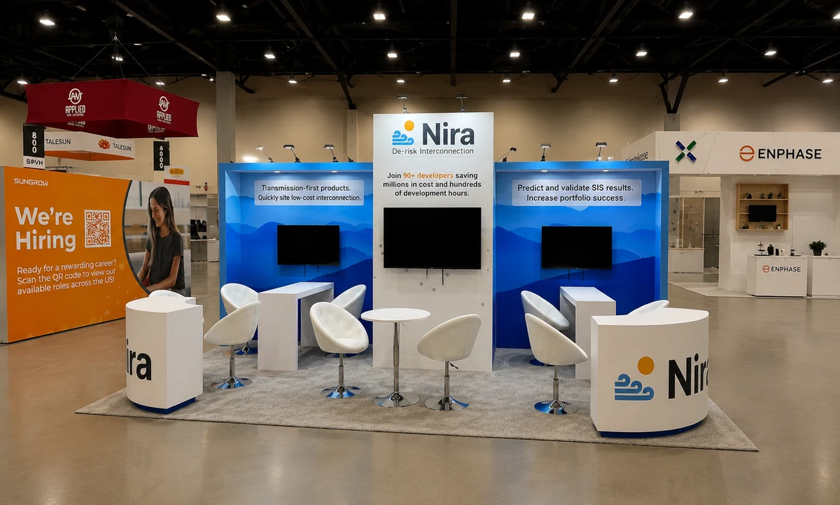 Nira 10×20 booth at CLEANPOWER 2025 in Phoenix with three screens, curved counters and white meeting furniture
